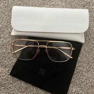 Elisa Johnson gold wire frame sunglasses, light tint lens.